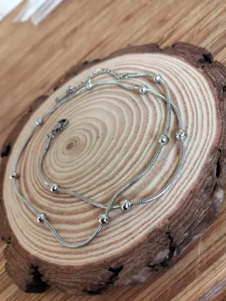 Gargantilla de acero con bolitas