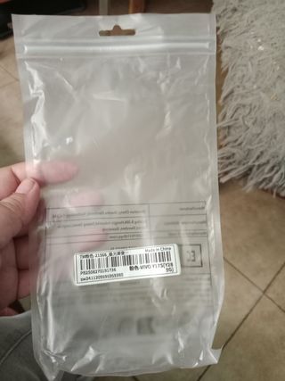 Funda rosa para móvil con cordón