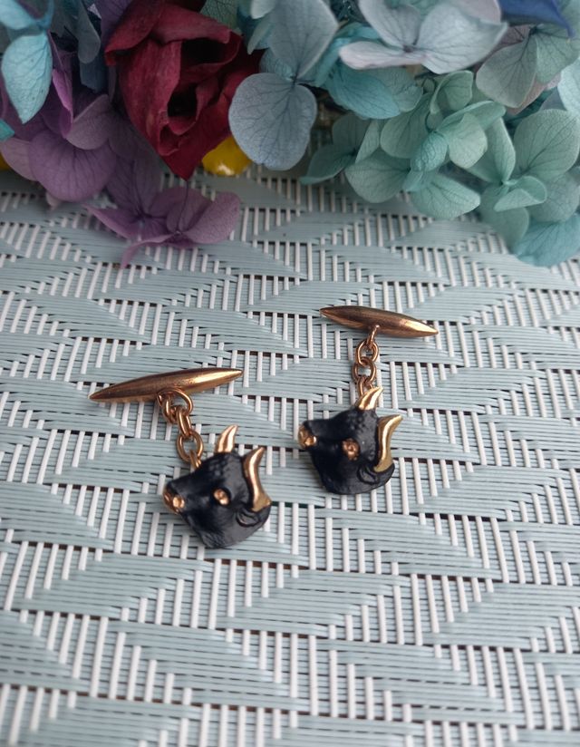 Gemelos antiguos cabeza de toro