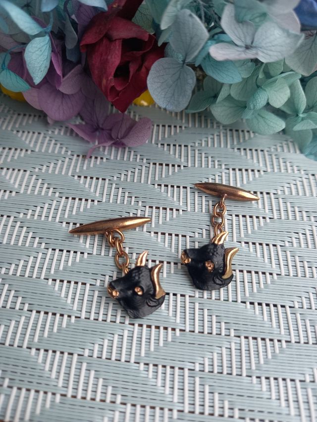 Gemelos antiguos cabeza de toro