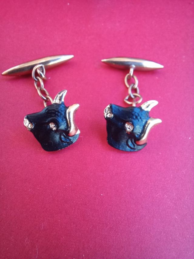 Gemelos antiguos cabeza de toro