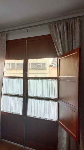 Puerta doble de madera maciza