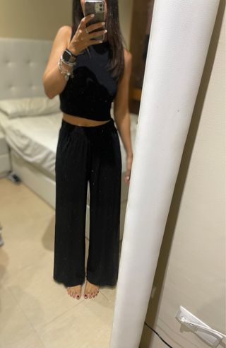 Pantalón fluido Zara negro elástico de segunda mano por 12,5 EUR