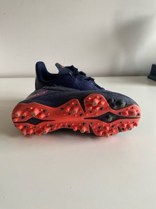 Botas de fútbol tacos niño