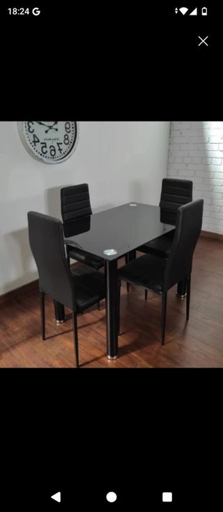 Mesa de comedor de cristal negra