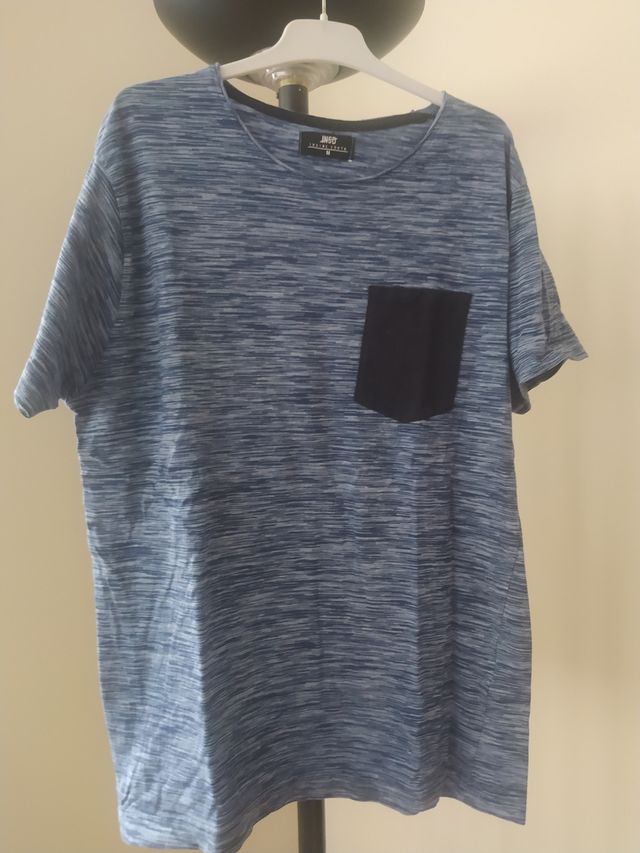 Camiseta niño azul jaspeado con bolsillo