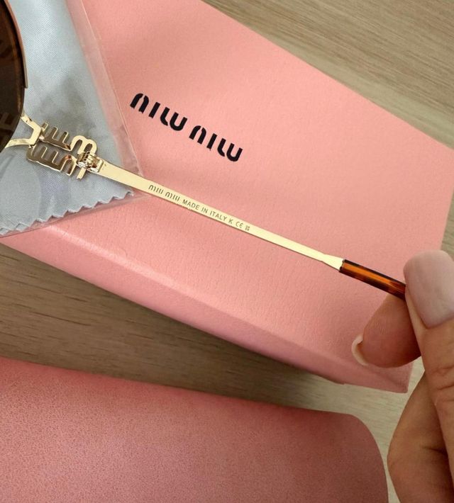 Gafas de sol Miu Miu doradas y marrones