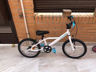 Bicicletas infantil B'TWIN blanca
y rosa y negra 