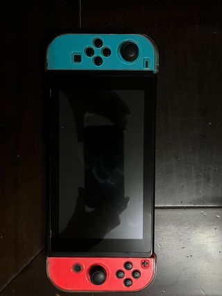 Nintendo Switch + 2 Mandos Pro + 8 Juegos + funda