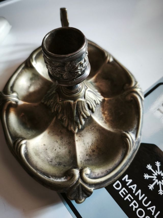 Dos palmatorias de plata  Meneses