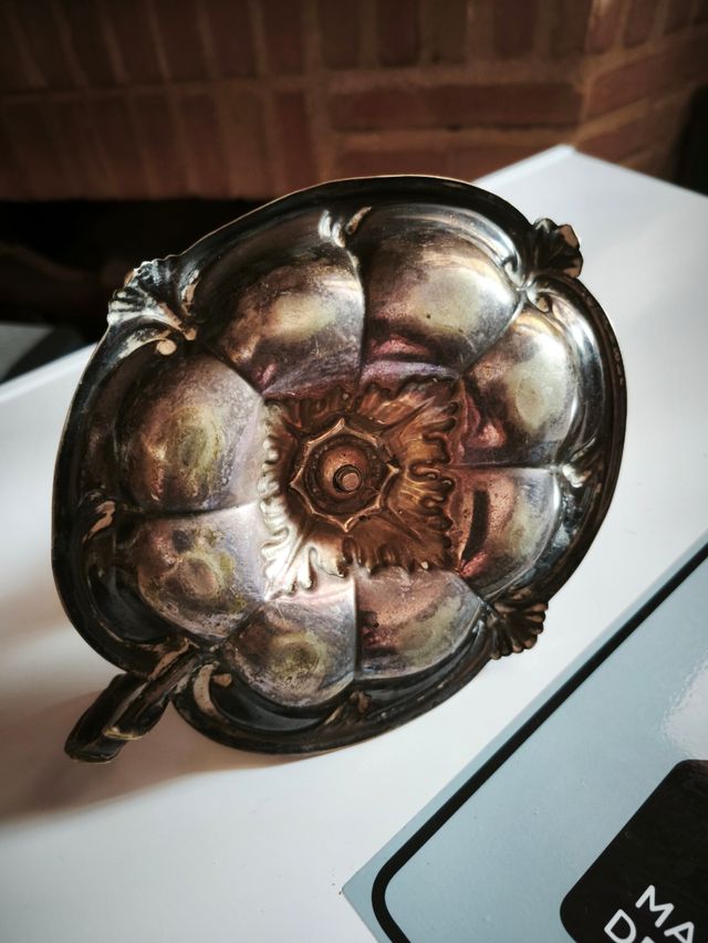 Dos palmatorias de plata  Meneses