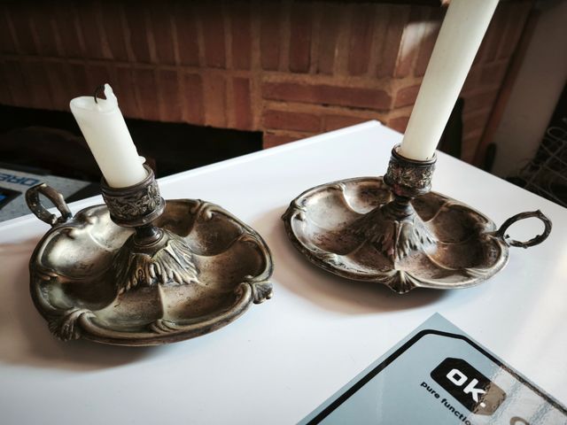 Dos palmatorias de plata  Meneses