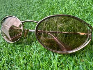 Gafas de sol Miu Miu doradas igual a nuevas!