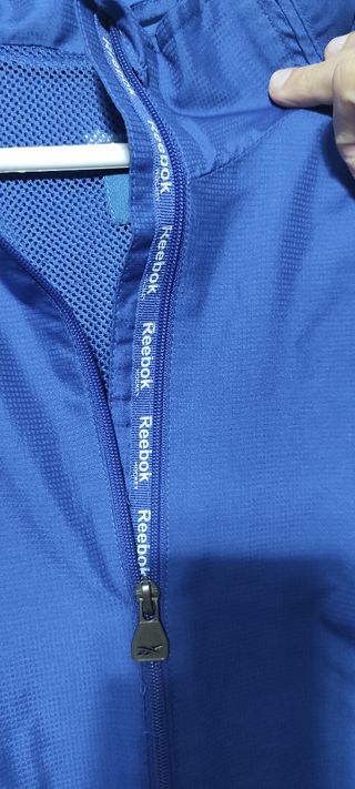 Chaqueta cortavientos Reebok hockey azul vintage 