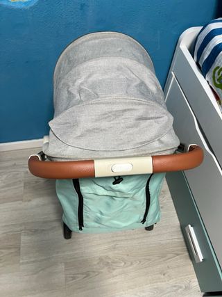 Cochecito de bebé turquesa