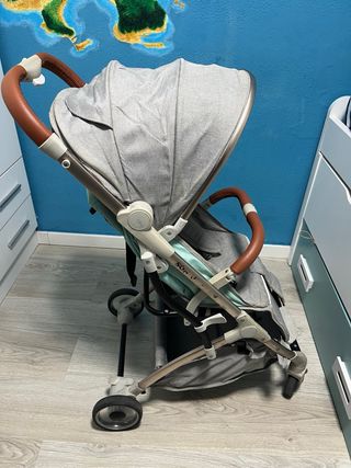 Cochecito de bebé turquesa