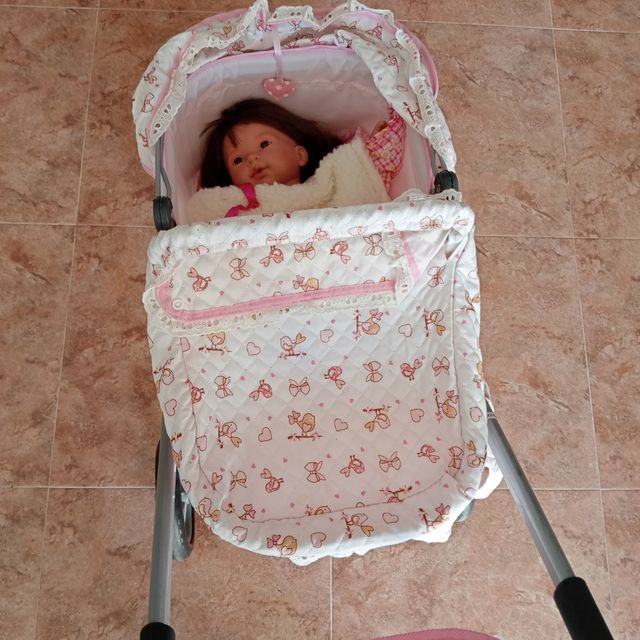 Passeggino per bambole con stampa di uccelli