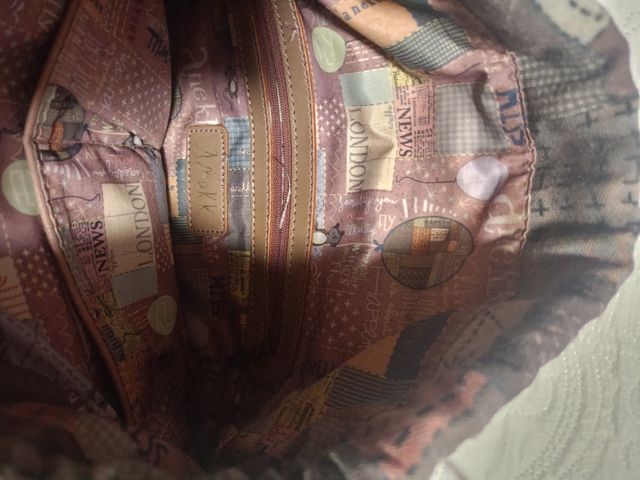 Mochila saco Anekke beige y multicolor