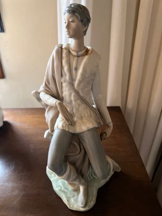 Figura de porcelana hombre sentado