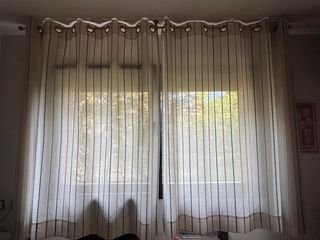 Tende beige e multicolore con strisce