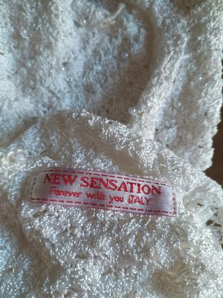 Canotta elegante bianca con perle