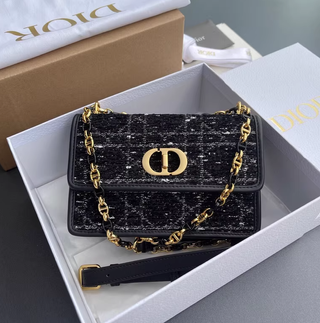 Borsa Dior nera e dorata da donna