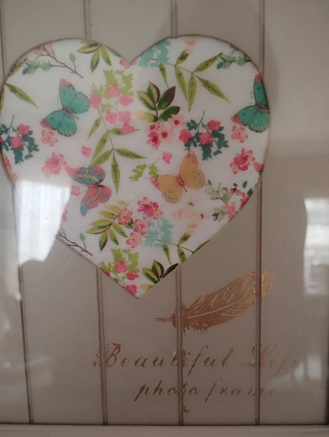 Marco de fotos corazón floral