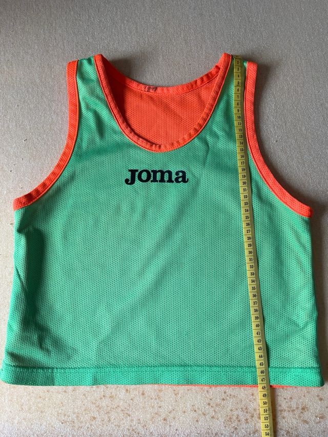 Peto Joma reversible naranja y verde.