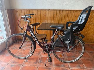 Bicicleta de paseo para adulto con silla infantil