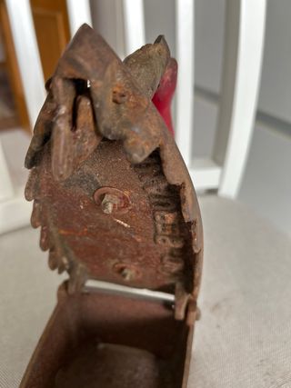 Plancha antigua de hierro fundido