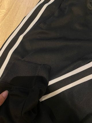 Pantalones Nike Negros con Rayas Blancas