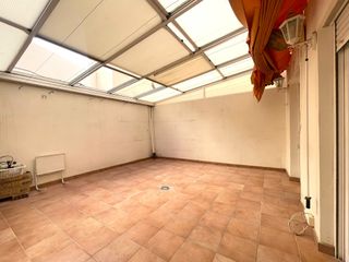 Piso Bajo  con Terraza 20m2 y Garaje