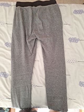 Pantalón largo gris con cremallera