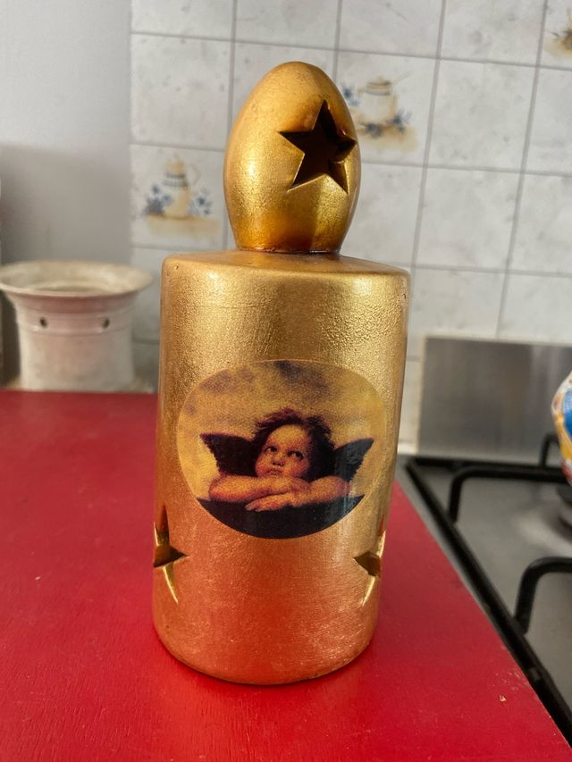 Portacandele dorato con angelo