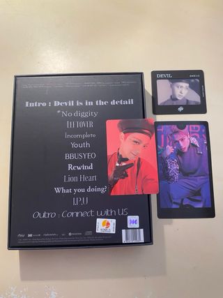 Álbum Devil de ONEUS versión negra con inclusiones