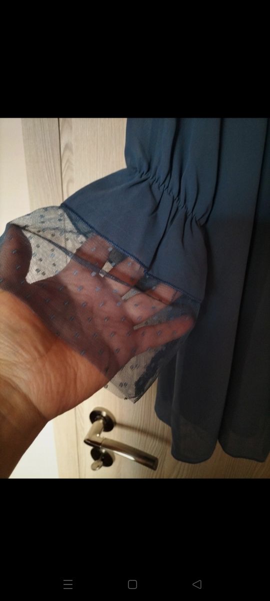 Blusa avio maniche lunghe con catena