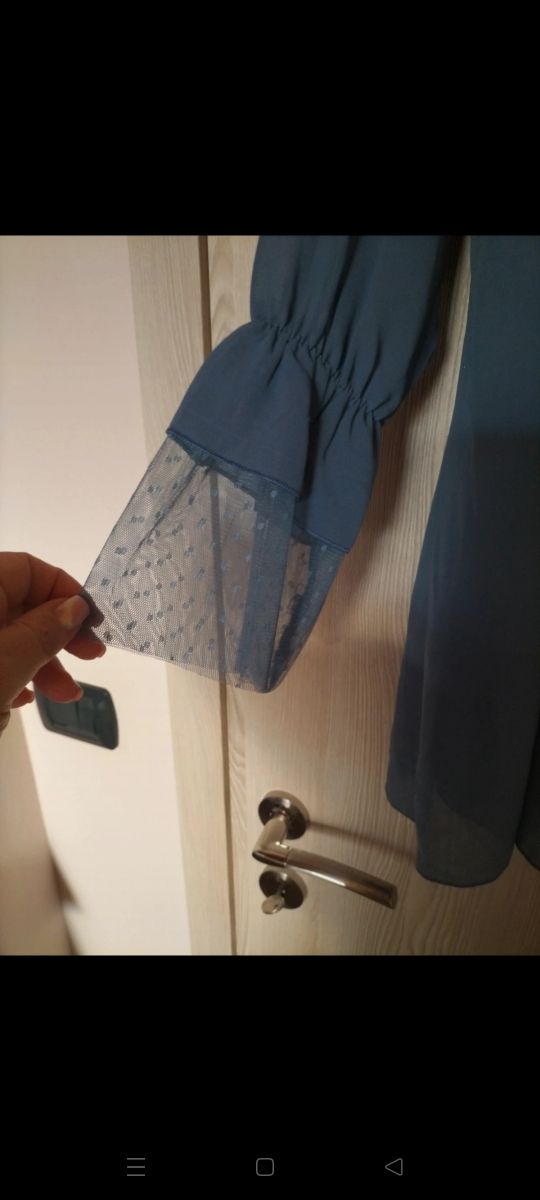 Blusa avio maniche lunghe con catena