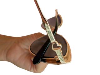 Occhiali da sole Moschino oro e neri