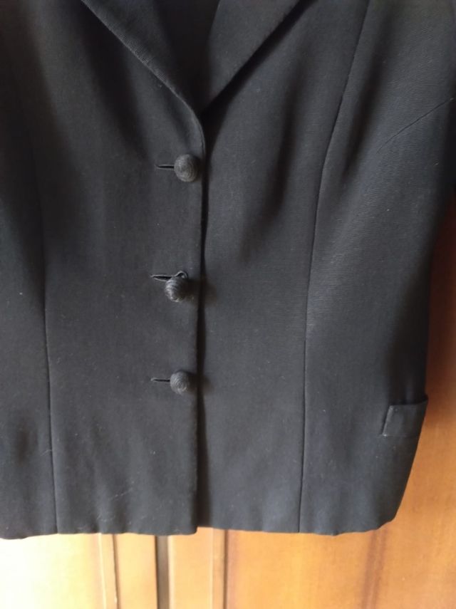 Bolero nero con collo in velluto