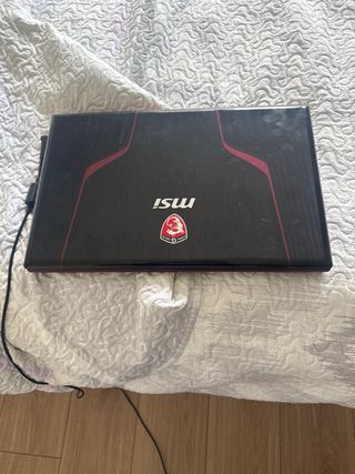 MSI GE60 2OE Portátil Negro y Rojo