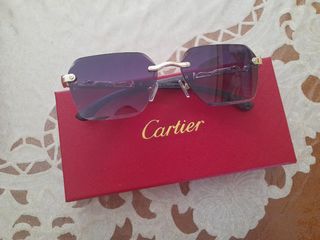 Occhiali da sole Cartier oro
