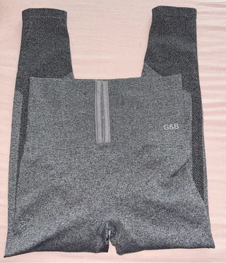 Leggings grises con cierre frontal