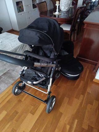 Carro de bebé negro + regalos