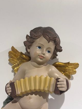 Ángel con acordeón, figura decorativa