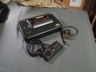 Sega Master System II con mando y adaptador TV