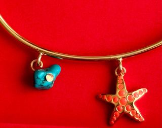 Pulsera Bimba y Lola dorada con estrellas y turque