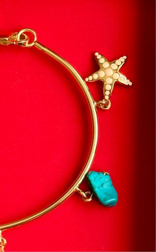 Pulsera Bimba y Lola dorada con estrellas y turque