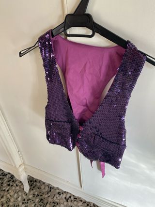 Chaleco lentejuelas niña morado. 