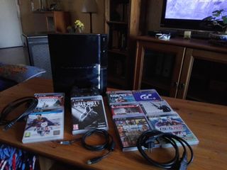Consola PlayStation 3 con juegos y mandos
