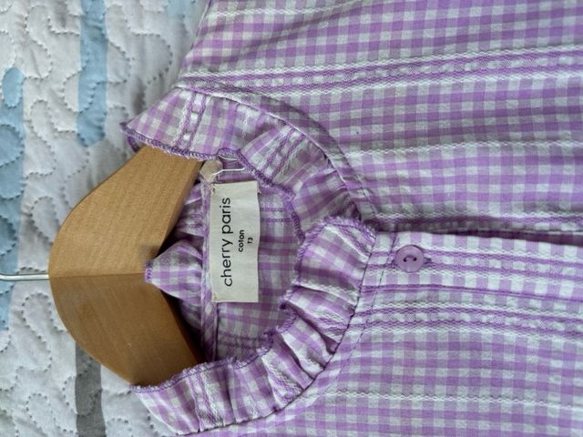 Camisa sin mangas a cuadros morada y blanca